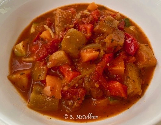 Ratatouille Is A French Stew. Made From End Of Summer Vegetables. Notably Eggplant, Zucchini, Onion, Peppers And Tomato.