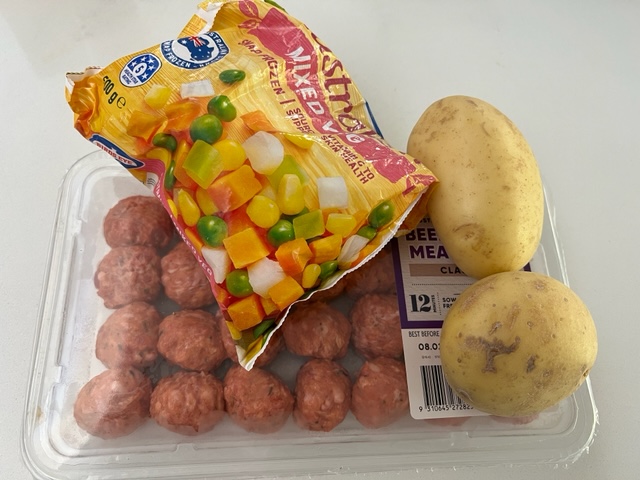 Short Cut Meatball Meal Consists Of Pre-Made Store Bought Meatballs With 2 Potatoes and Frozen Vegetables.