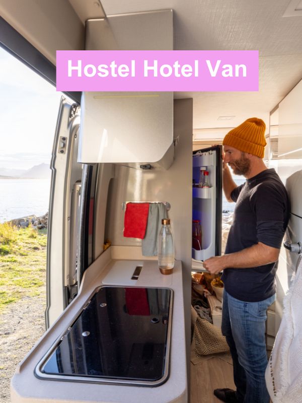 Hostel Hotel Van Header - a male cooking a meal in his van.