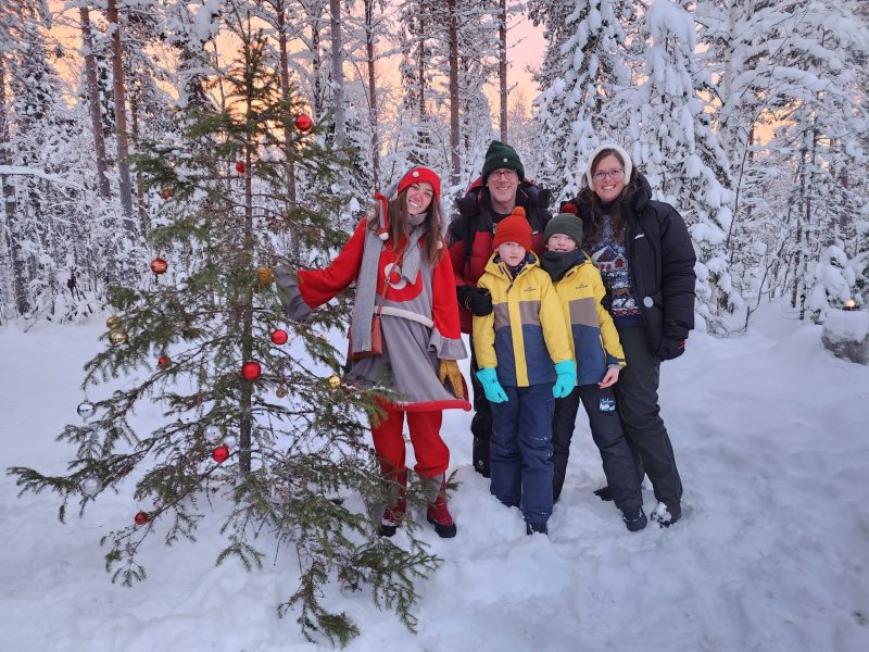 Erin Parker with family having a Lapland Christmas in the snow