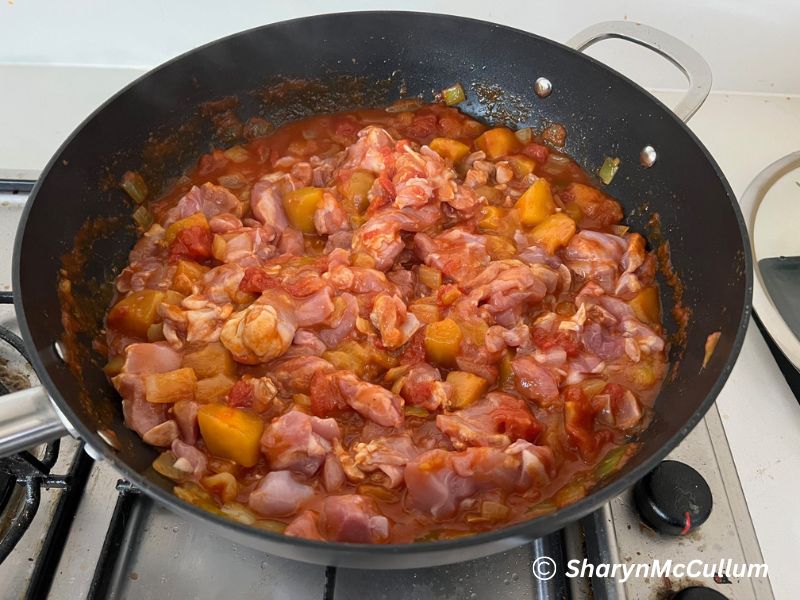 add chicken to the mango curry sauce