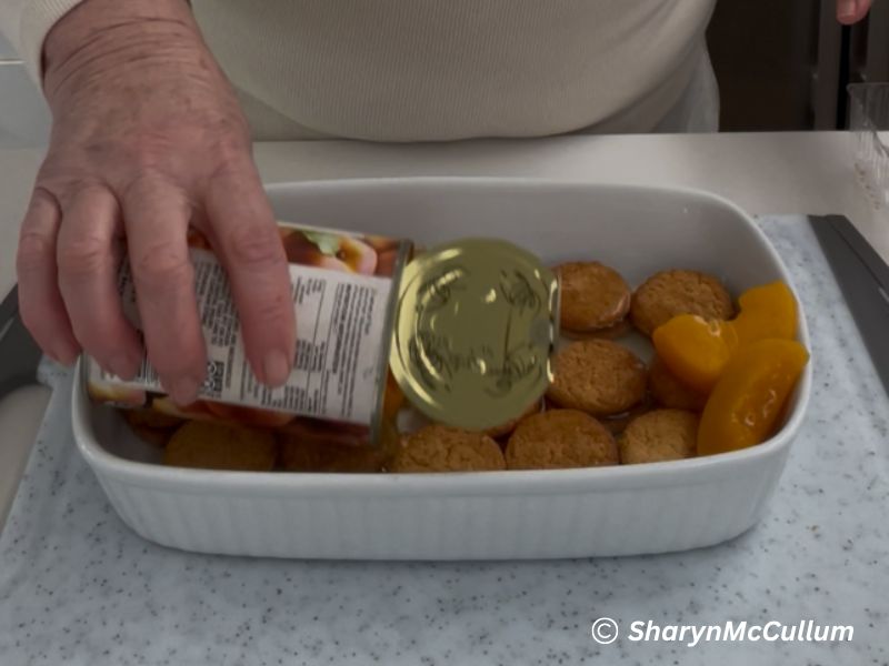 layer Kingston biscuits then pour tin of peaches over biscuits